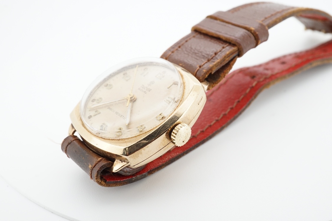 A 1950's 9ct gold Tudor Royal manual wind wrist watch, with Arabic dial, case diameter 27mm, with case back inscription, on a later associated strap.